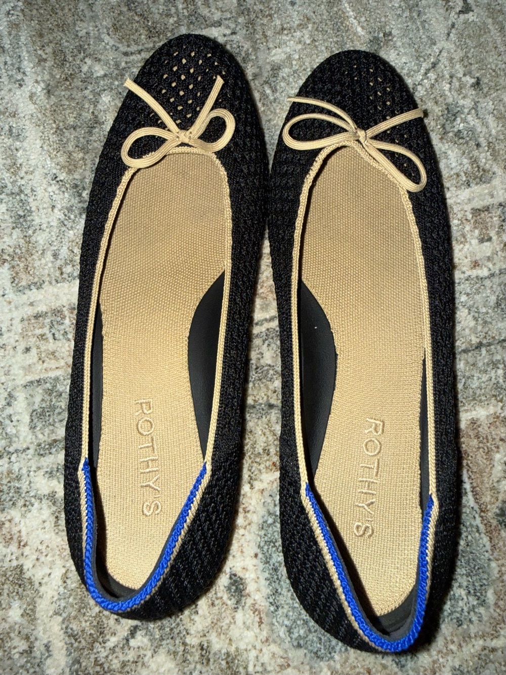 Rothy's Black Flats with Tan Trim and Blue Heel Accent
